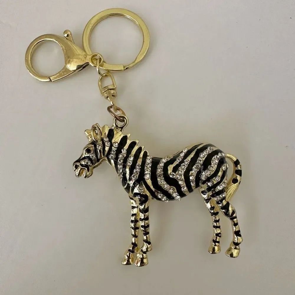 Gold tone black and rhinestone zebra keychain